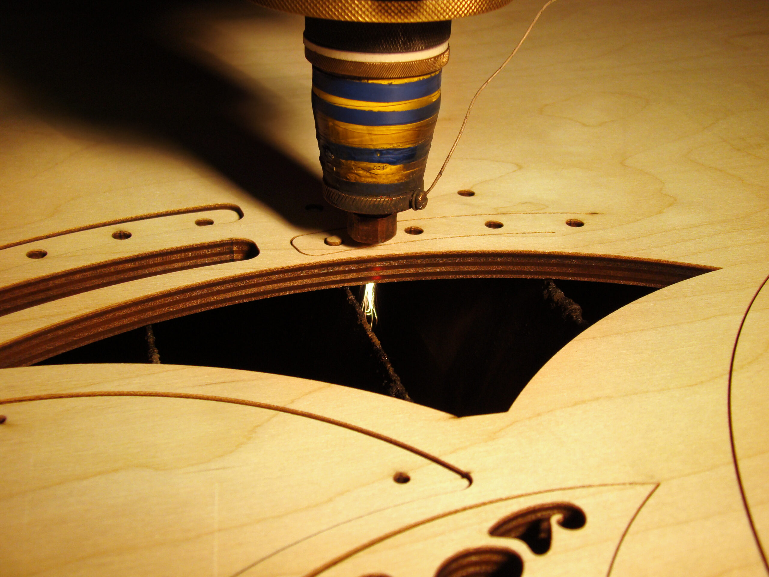 Laser,Torch,Is,Cutting,A,Plywood,Plate